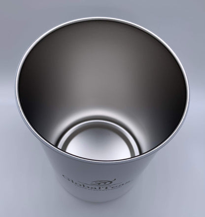 A sleek, stainless steel cup interior featuring the logo of Global Tea, viewed from above against a gray background.