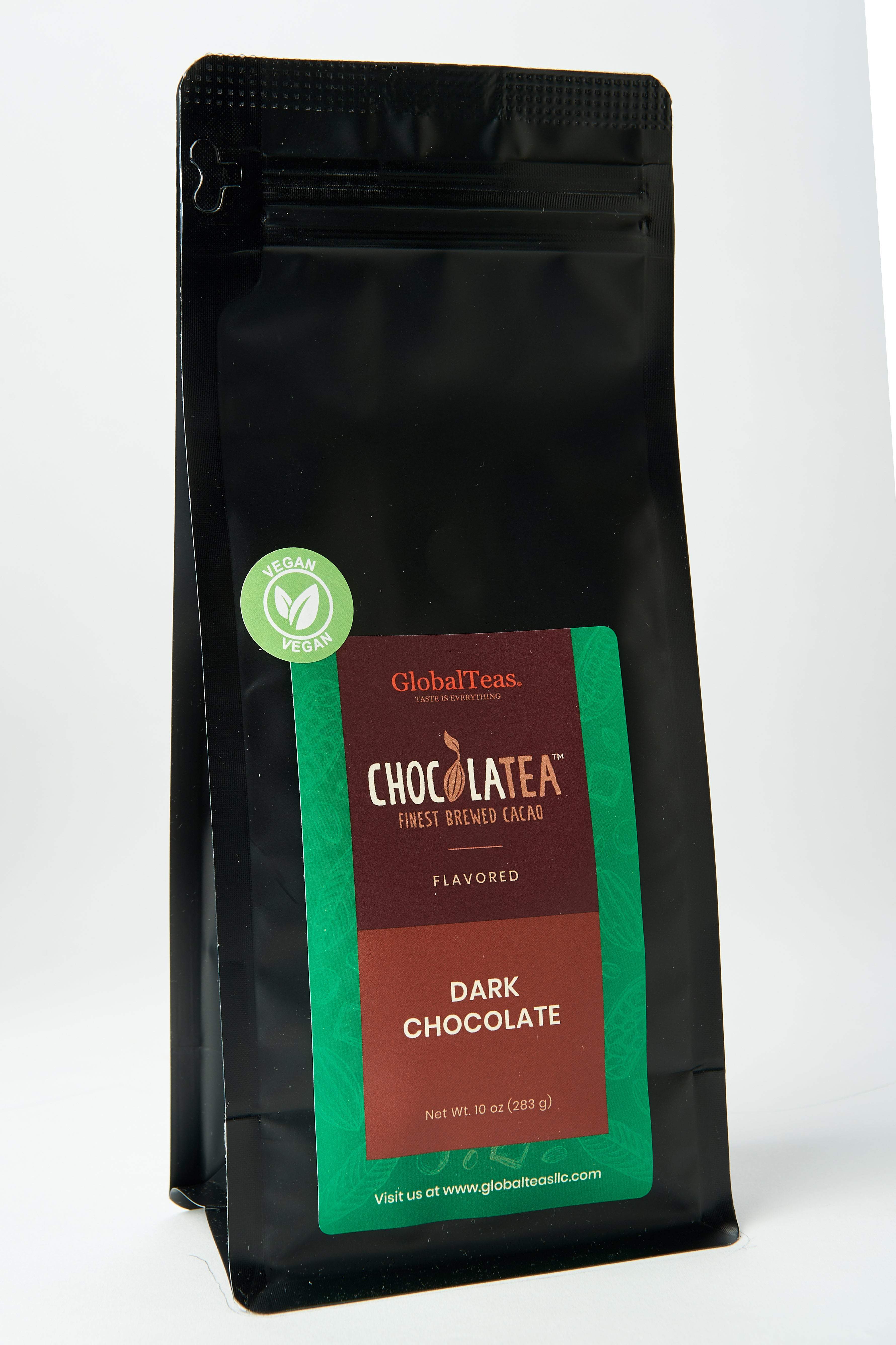 Black bag of GlobalTeas' Chocolatea flavored dark chocolate cacao, featuring a vegan label and green accents.
